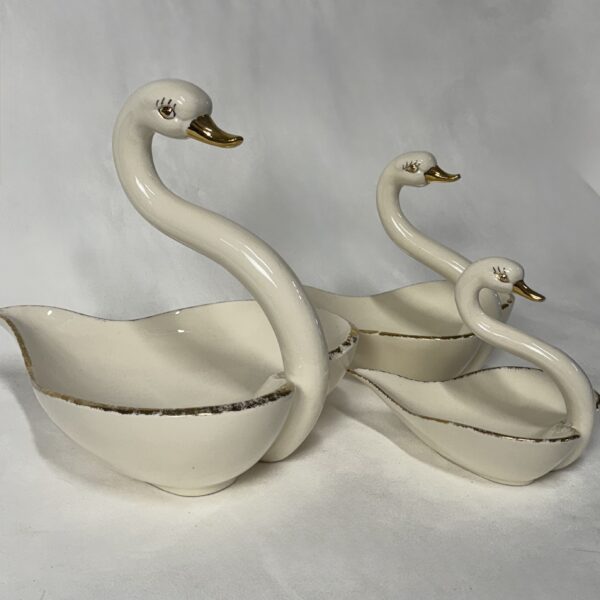 Three Sweet Heart-Shaped Swans