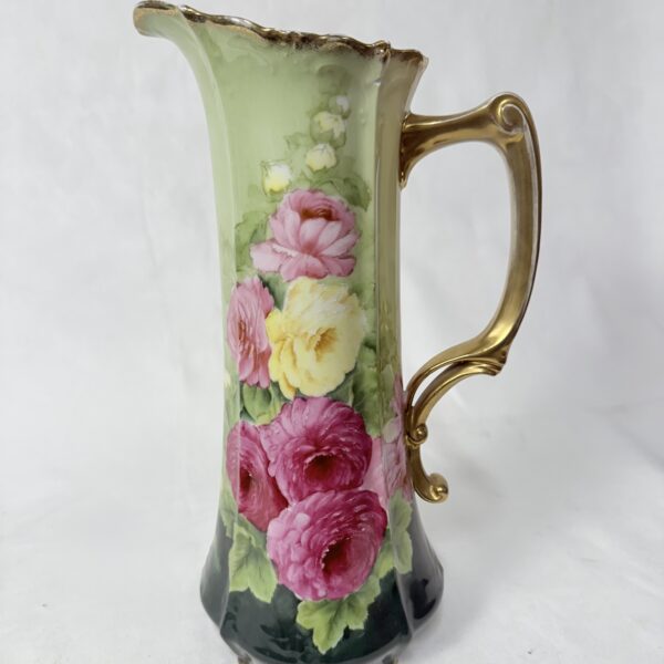 Green sweetheart pitcher with pretty pink flowers